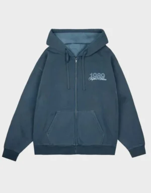 Front view of 1989 Taylor’s Version Is It Over Now blue zip-up hoodie with embroidered chest logo and full zip design